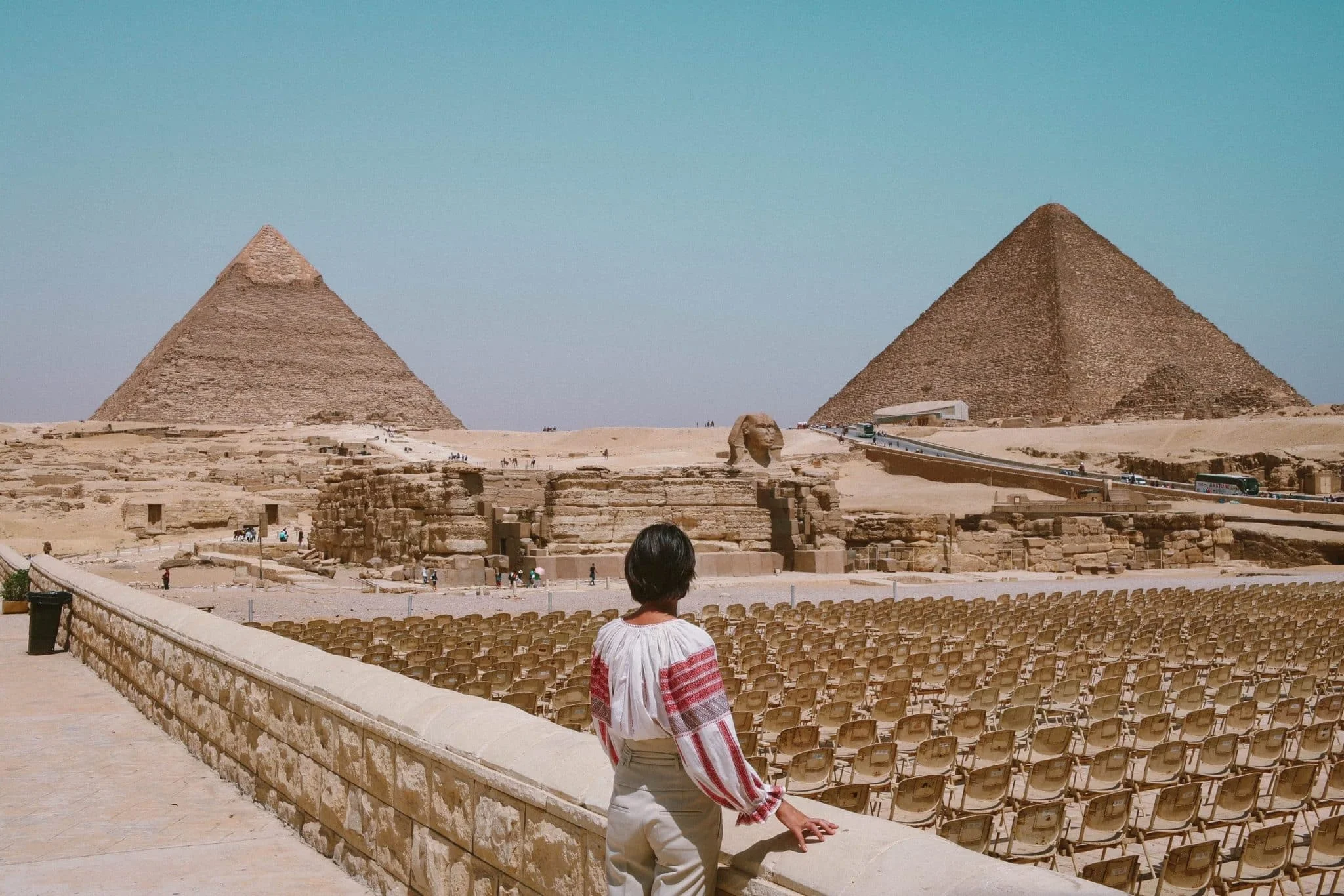 Lady looking at the pyramids
